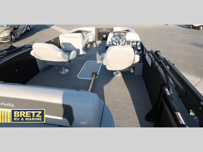 Slide: The Image of 2025 Aria Cast-N-Cruise A22CC boat interior at Bretz RV & Marine dealership. - 22