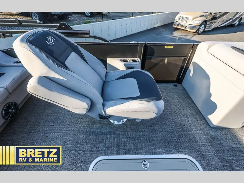 Slide: The Image of 2025 Aria Cast-N-Cruise A22CC boat interior with gray seating at Bretz RV & Marine. - 30