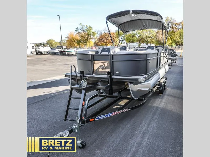 Slide: The Image of 2025 Aria Cast-N-Cruise A22CC pontoon boat on trailer at Bretz RV & Marine. - 4