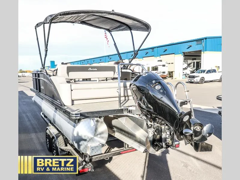 Slide: The Image of 2025 Aria Cast-N-Cruise A22CC pontoon boat with outboard motor at Bretz RV & Marine. - 5
