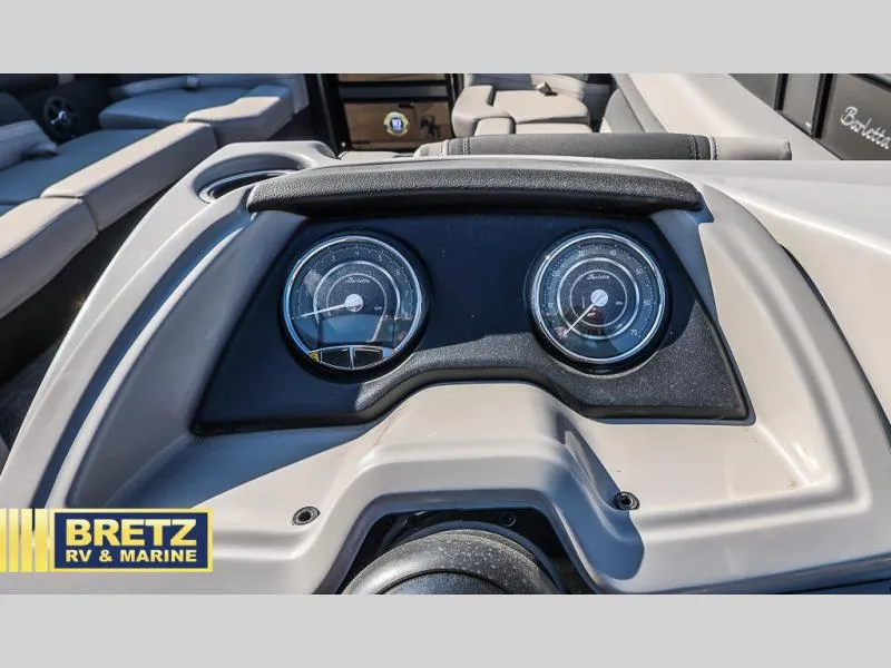 Slide: The Image of Dashboard of 2025 Cabrio Ultra-Lounge C24UC boat with dual gauges. - 11