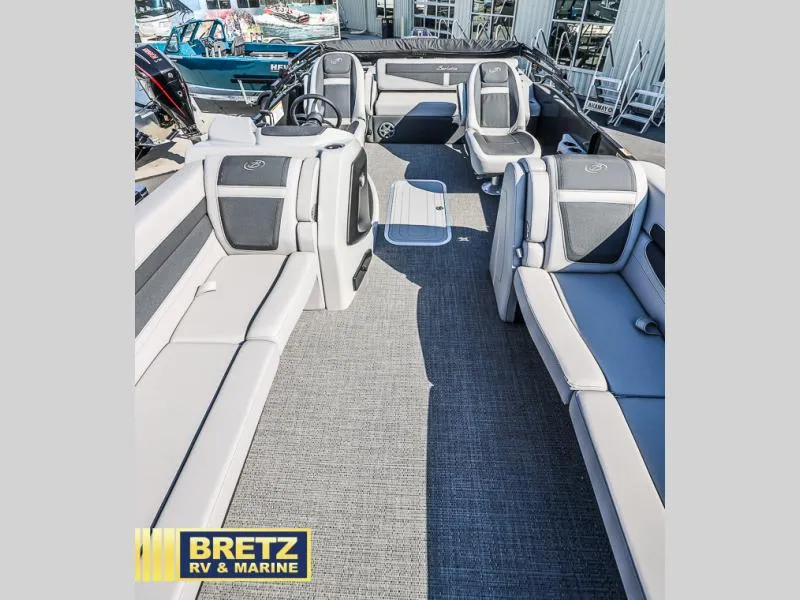 Slide: The Image of 2025 Cabrio Ultra-Lounge C24UC boat interior with plush seating and modern design. - 13
