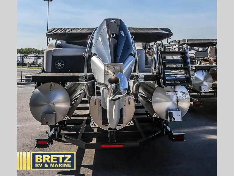 Slide: The Image of 2025 Cabrio Ultra-Lounge C24UC pontoon boat with powerful outboard motor at Bretz RV & Marine. - 6