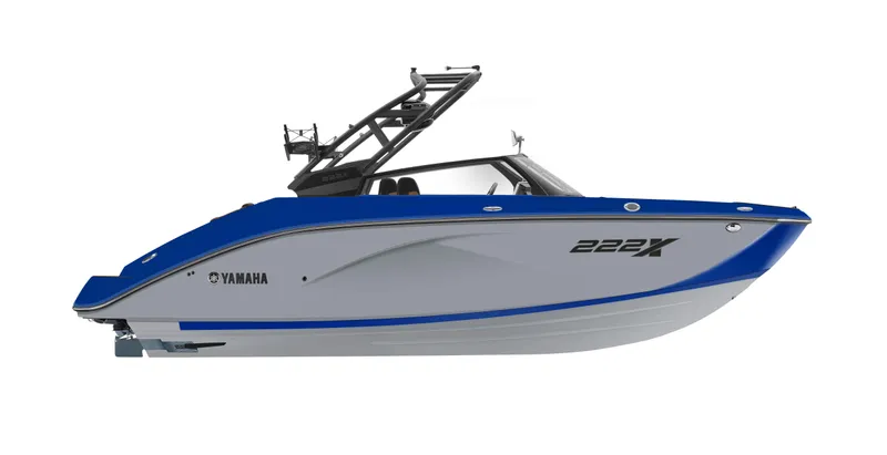 Slide: The Image of 2025 Yamaha Boats 222XE, sleek blue and white design, side view. - 16