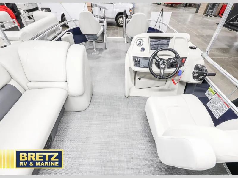 Slide: The Image of Interior of 2025 Vista Fish 18 boat with steering console and seating, displayed at Bretz RV & Marine. - 13