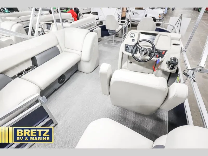 Slide: The Image of 2025 Vista Fish 18 boat interior with plush seating and modern dashboard at Bretz RV & Marine. - 14