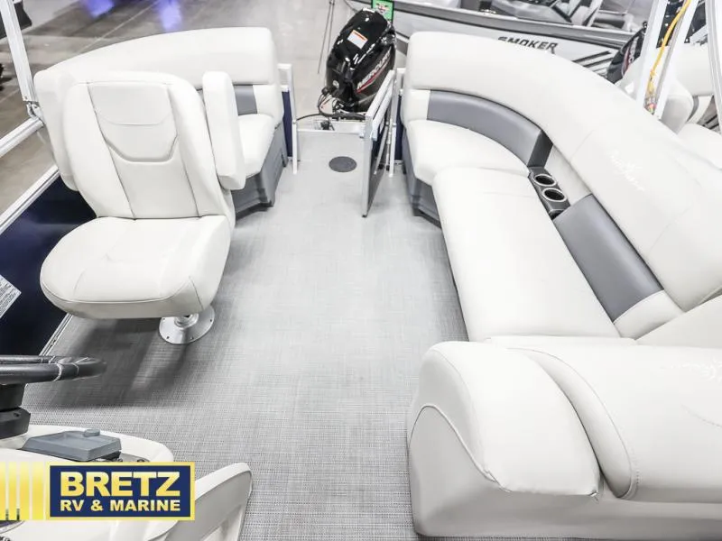 Slide: The Image of 2025 Vista Fish 18 boat interior with plush seating and modern design. - 19
