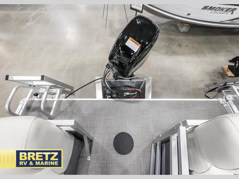 Slide: The Image of Vista Fish 18 boat, 2025 model, with motor, displayed at Bretz RV & Marine showroom. - 21