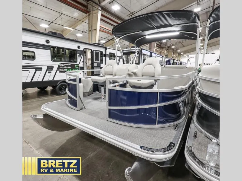 Slide: The Image of 2025 Vista Fish 18 pontoon boat displayed at Bretz RV & Marine showroom. - 4