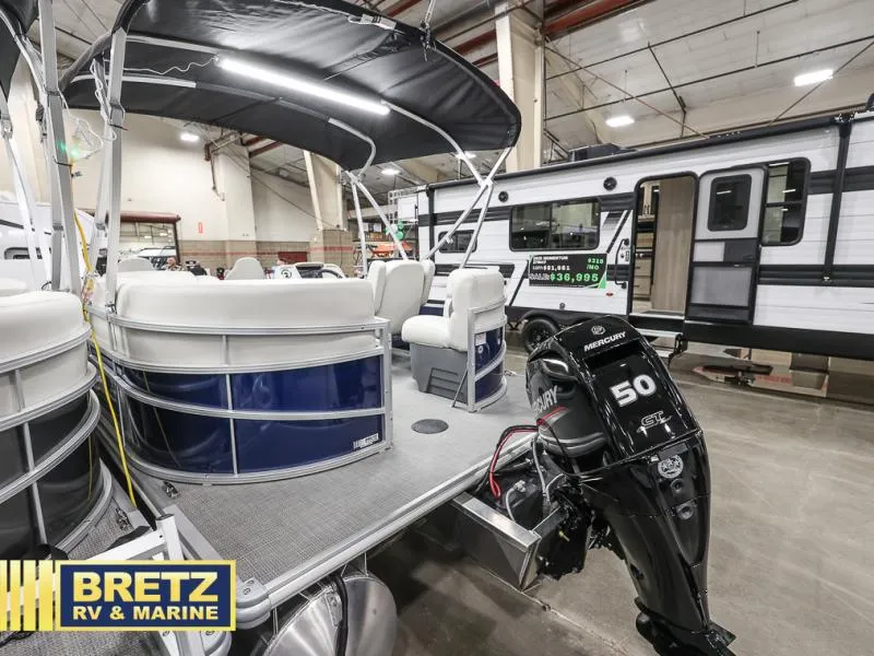 Slide: The Image of 2025 Vista Fish 18 pontoon boat with Mercury 50 engine at Bretz RV & Marine showroom. - 7