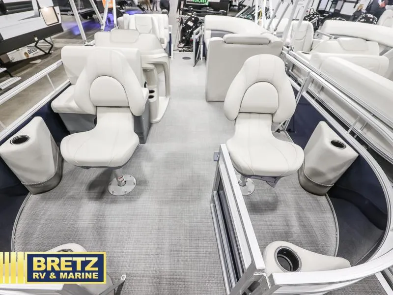 Slide: The Image of 2025 Vista Fish 18 boat interior with white seating, showcased at Bretz RV & Marine. - 9