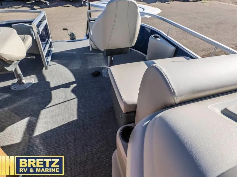 Slide: The Image of Interior of 2025 Vista Fish 18 boat with seating and carpeted floor. - 12