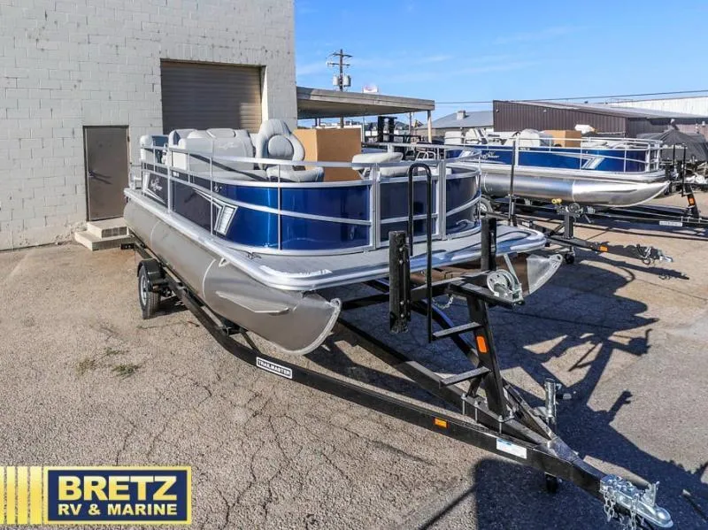 Slide: The Image of 2025 Vista Fish 18 pontoon boat on trailer at Bretz RV & Marine dealership. - 3