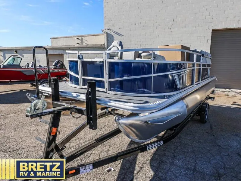 Slide: The Image of 2025 Vista Fish 18 pontoon boat on trailer at Bretz RV & Marine dealership. - 5