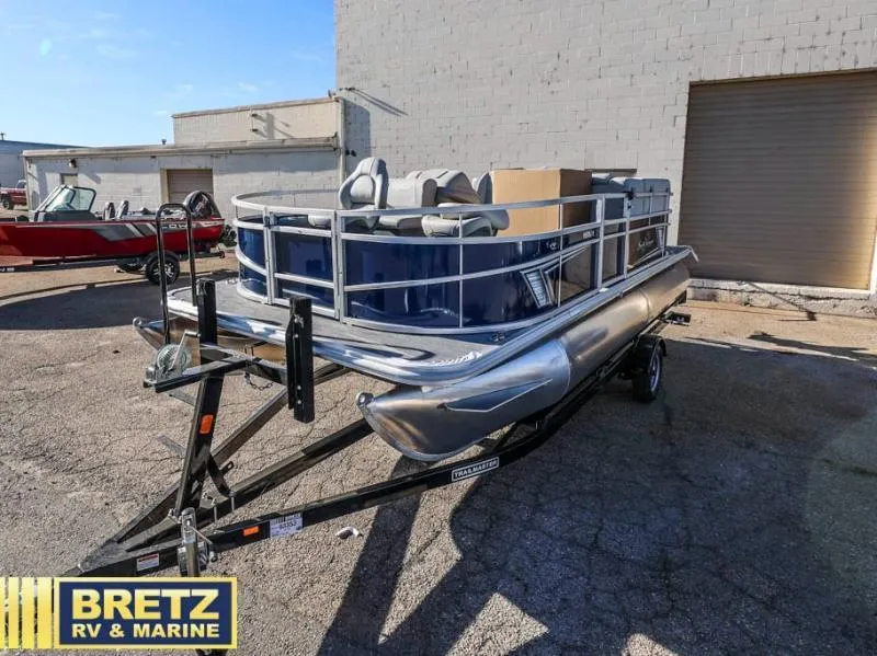 Slide: The Image of 2025 Vista Fish 18 pontoon boat on trailer at Bretz RV & Marine dealership. - 6