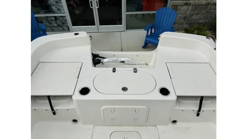 Slide: The Image of 2025 Carolina Skiff 21 LS boat interior with storage compartments and seating. - 6