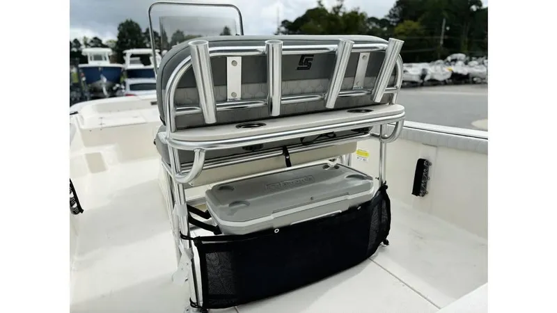Slide: The Image of 2025 Carolina Skiff 21 LS boat interior with storage and seating features. - 9