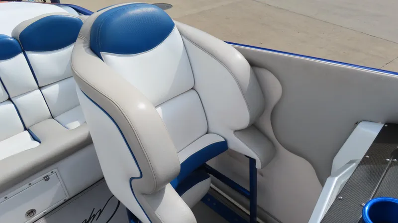 Slide: The Image of 2007 Cigarette 38 Top Gun boat interior with blue and white seating. - 18