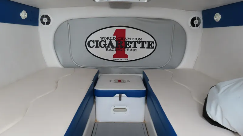 Slide: The Image of Interior of 2007 Cigarette 38 Top Gun boat with branded seating and storage. - 26