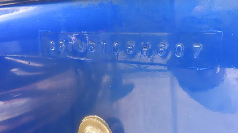 Slide: The Image of Close-up of a 2007 Cigarette 38 Top Gun boat hull identification number. - 28