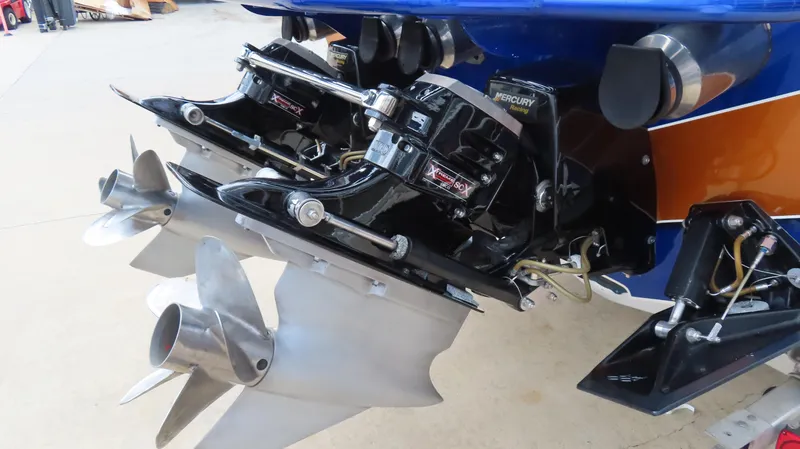 Slide: The Image of 2007 Cigarette 38 Top Gun boat with dual Mercury outboard engines. - 8