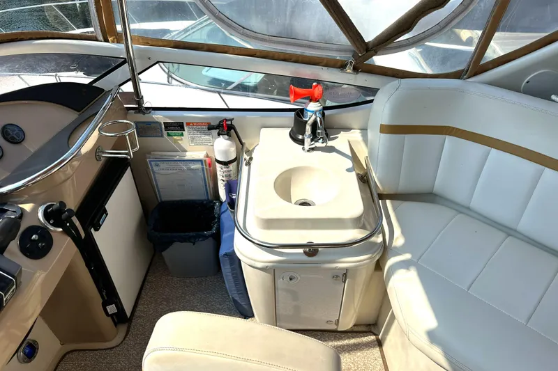 Slide: The Image of Interior of 2005 Carver 366 Motor Yacht with sink and seating area. - 15