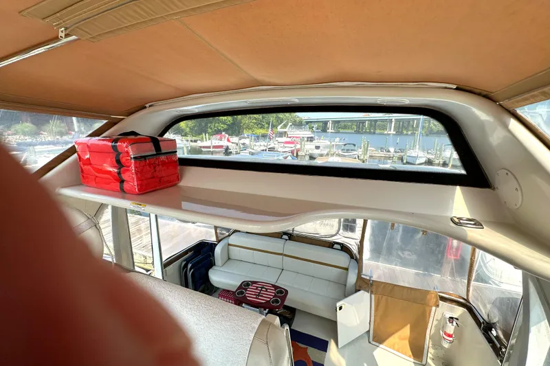 Slide: The Image of Interior view of 2005 Carver 366 Motor Yacht with seating and storage. - 18