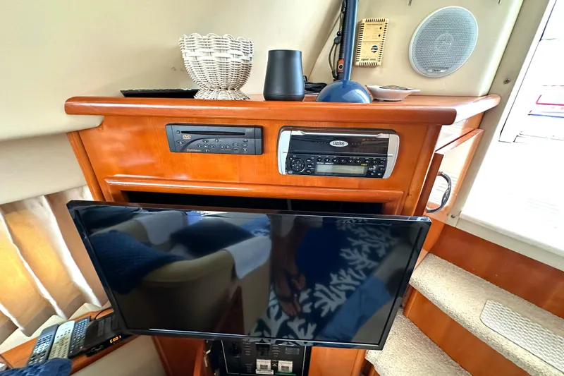 Slide: The Image of Interior of 2005 Carver 366 Motor Yacht with TV and audio system. - 25