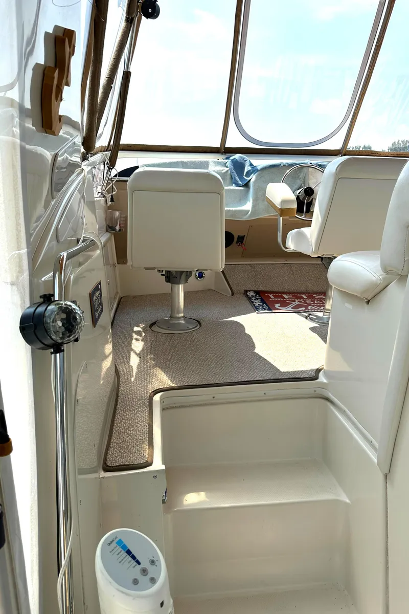 Slide: The Image of Interior view of 2005 Carver 366 Motor Yacht with seating and helm. - 42