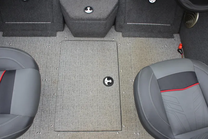 Slide: The Image of 2023 Tracker PG 175 WT SW boat interior with gray seating and storage compartment. - 16