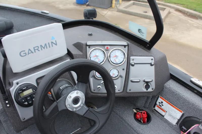 Slide: The Image of 2023 Tracker PG 175 WT SW boat dashboard with Garmin navigation system. - 17
