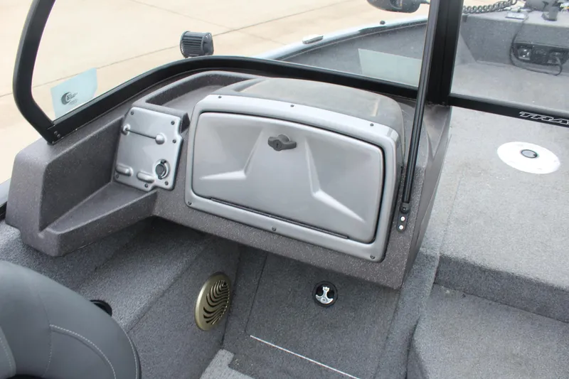 Slide: The Image of 2023 Tracker PG 175 WT SW boat interior with storage compartment and seating. - 18