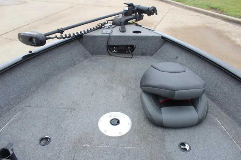 Slide: The Image of 2023 Tracker PG 175 WT SW boat interior with seating and trolling motor. - 20