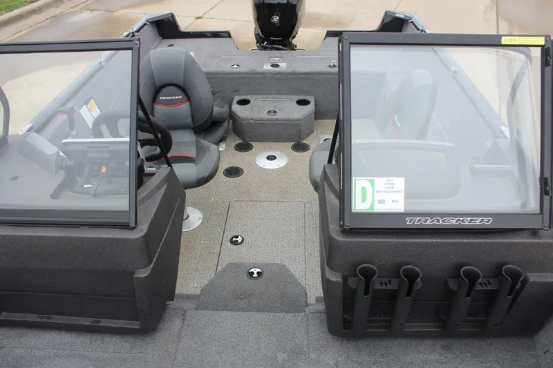 Slide: The Image of 2023 Tracker PG 175 WT SW boat interior with seating and storage compartments. - 22