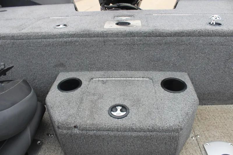 Slide: The Image of 2023 Tracker PG 175 WT SW boat interior with cup holders and seating. - 24