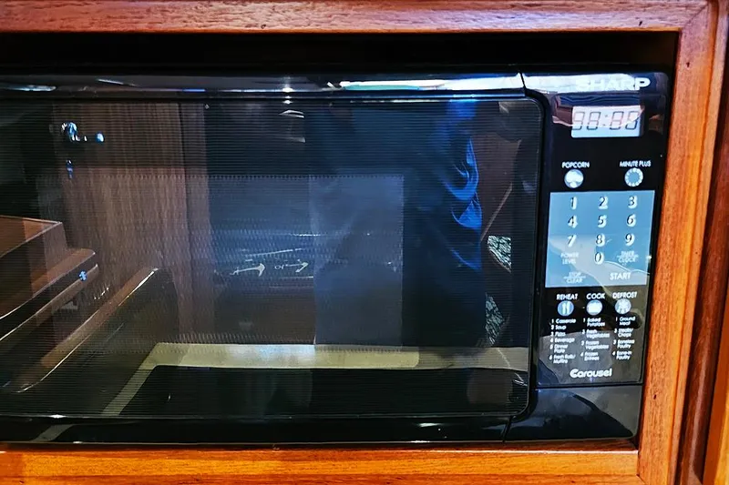 Slide: The Image of Sharp Carousel microwave in a Menorquin 120 yacht, 2003 model, with digital display. - 19