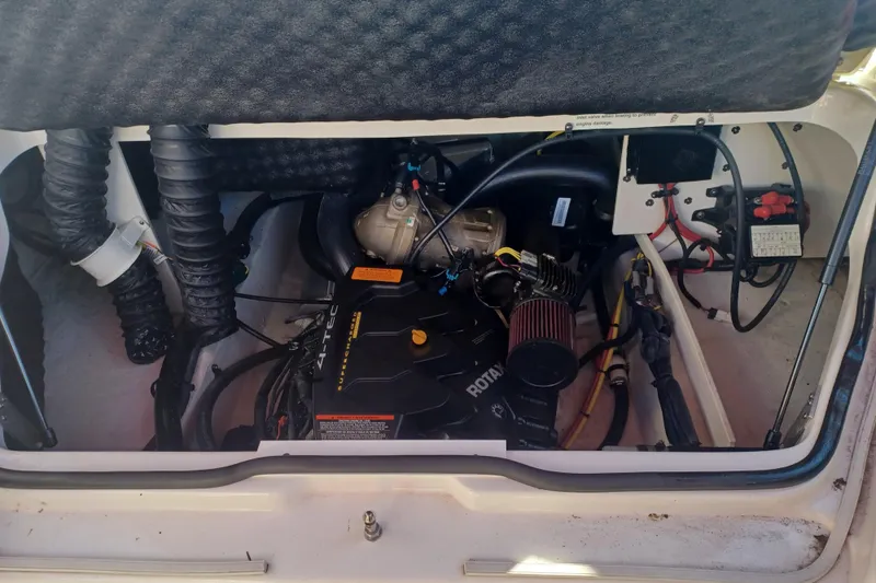 Slide: The Image of Engine compartment of a 2016 Chaparral Vortex 203 VRX boat. - 10