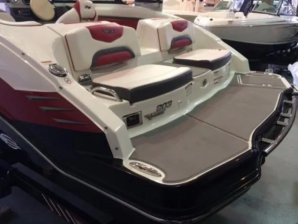 Slide: The Image of 2016 Chaparral Vortex 203 VRX boat with red and white seating, rear view. - 4