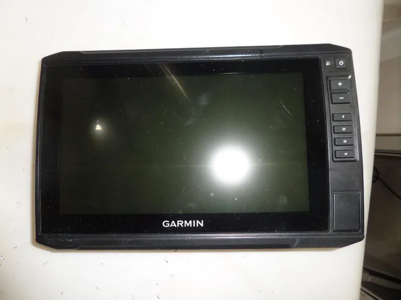 Slide: The Image of Garmin GPS device for 1999 Sport-Craft 251 WA boat, featuring a touchscreen interface. - 14