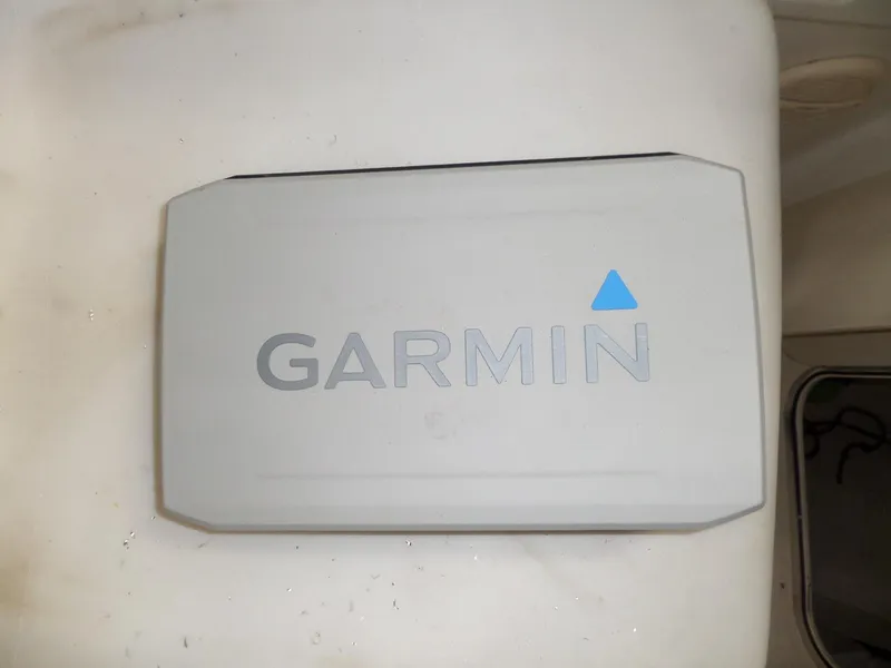 Slide: The Image of Garmin device on 1999 Sport-Craft 251 WA boat. - 15