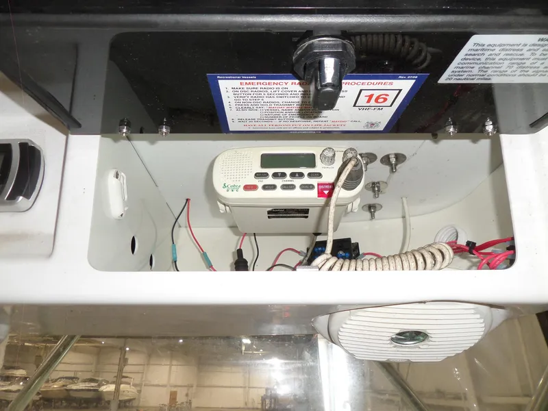 Slide: The Image of 1999 Sport-Craft 251 WA boat radio and control panel. - 22