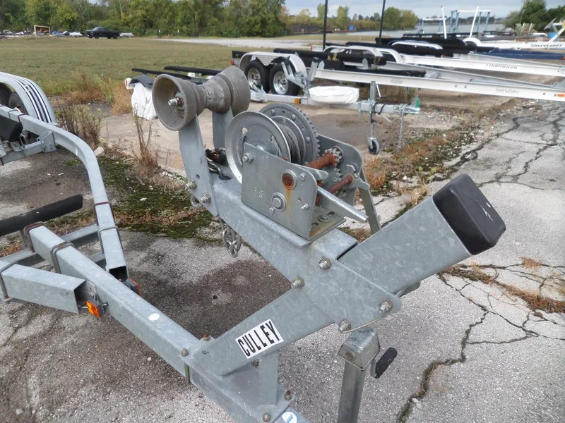Slide: The Image of Boat trailer winch for 1999 Sport-Craft 251 WA on cracked pavement. - 33