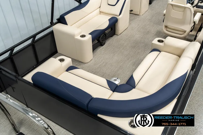 Slide: The Image of Luxurious 2025 Tahoe LTZ EL boat interior with plush seating and cup holders. - 11