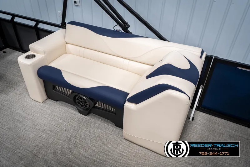 Slide: The Image of Luxurious 2025 Tahoe LTZ EL boat seating with cup holder and speaker system. - 21