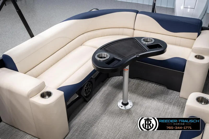 Slide: The Image of Luxurious 2025 Tahoe LTZ EL boat interior with plush seating and cup holders. - 24