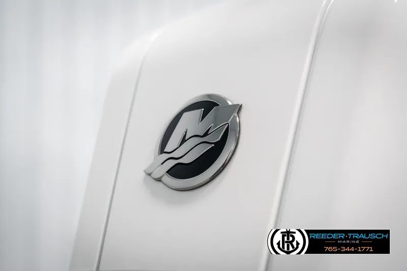 Slide: The Image of 2025 Tahoe LTZ EL emblem on white surface, Reeder-Trausch Marine logo visible. - 40