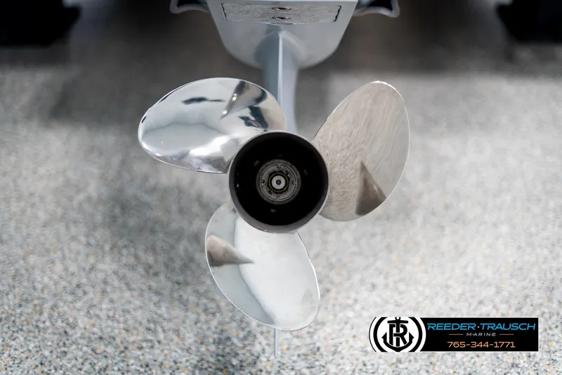 Slide: The Image of 2025 Tahoe LTZ EL boat propeller on display at Reeder-Trausch Marine showroom. - 42