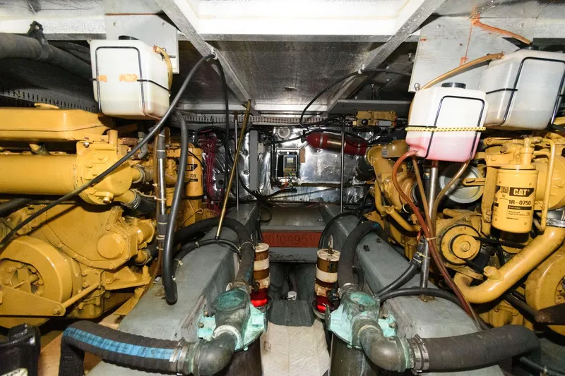 Slide: The Image of Engine room of 1994 Carver 440 Aft Cabin Motor Yacht with dual engines. - 23