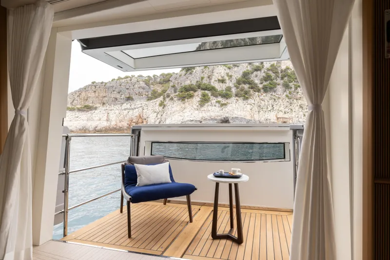Slide: The Image of Luxurious Benetti Oasis 34M yacht deck with scenic ocean view, 2025 model. - 25