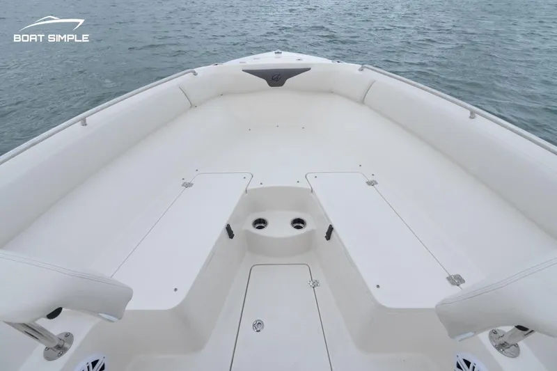 Slide: The Image of 2024 Sailfish 242 CC boat interior with spacious seating and ocean view. - 8